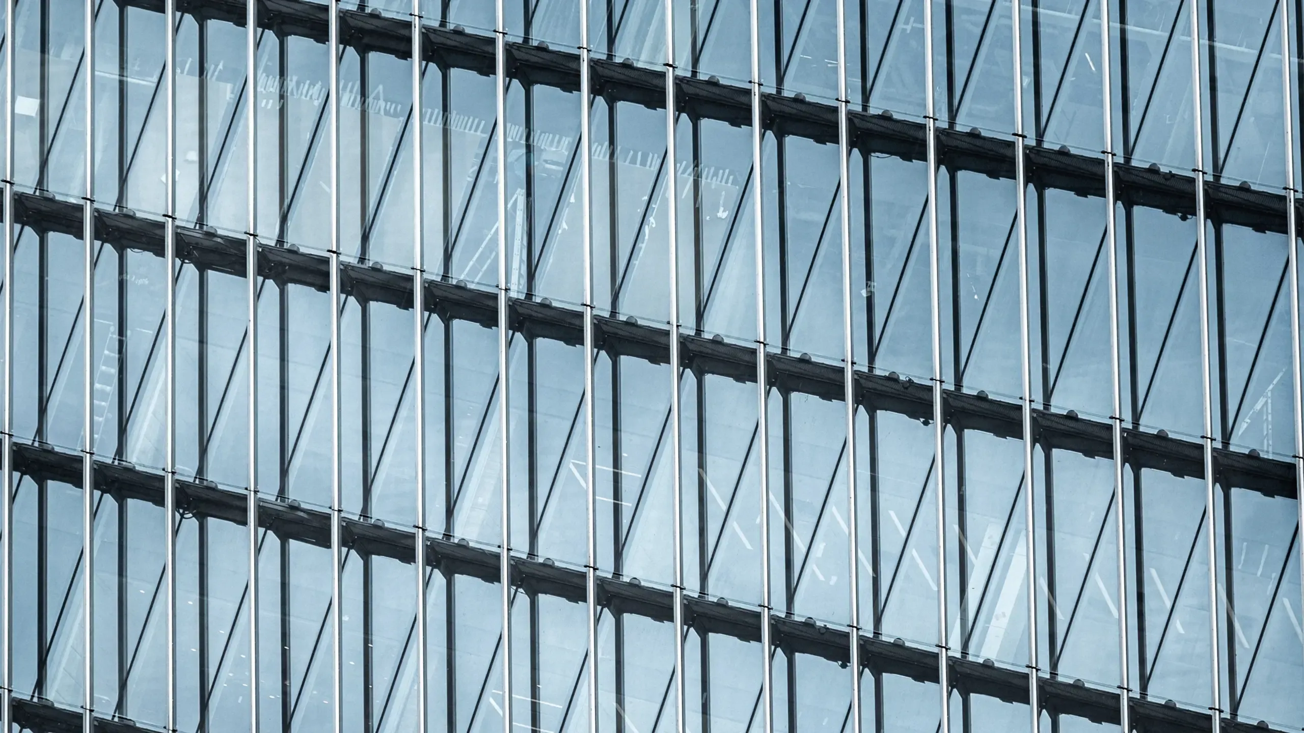 Close-up of a glass skyscraper facade. 