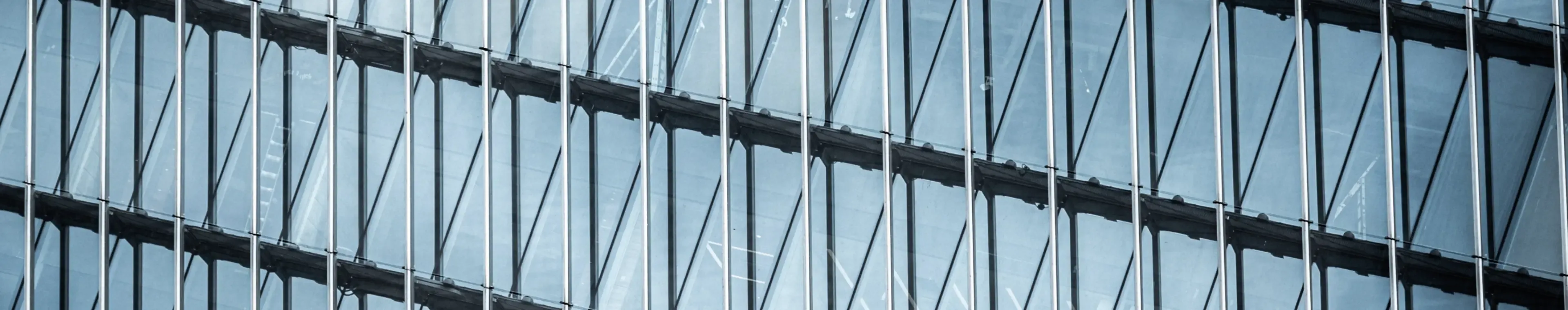 Close-up of a glass skyscraper facade. 
